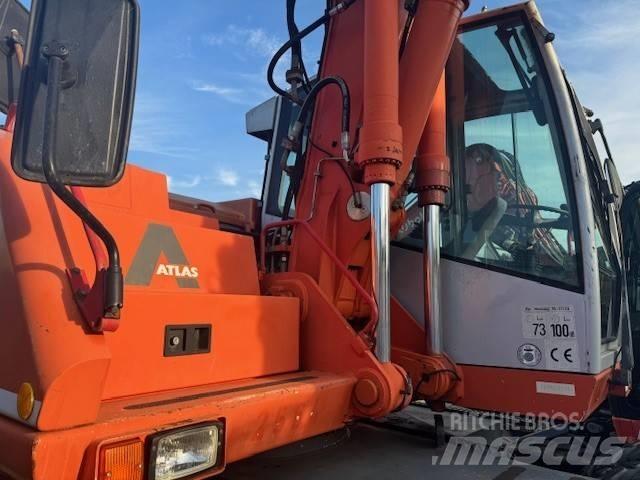 Atlas 1304 Pelle sur pneus
