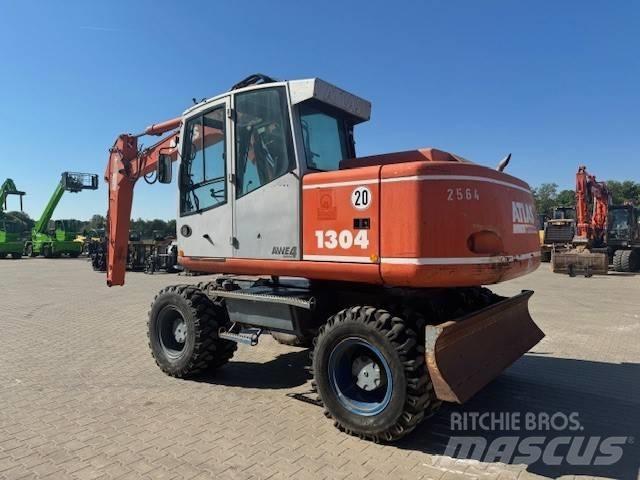 Atlas 1304 Pelle sur pneus