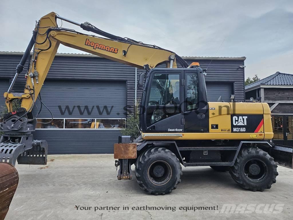 CAT M 316 D Pelle sur pneus