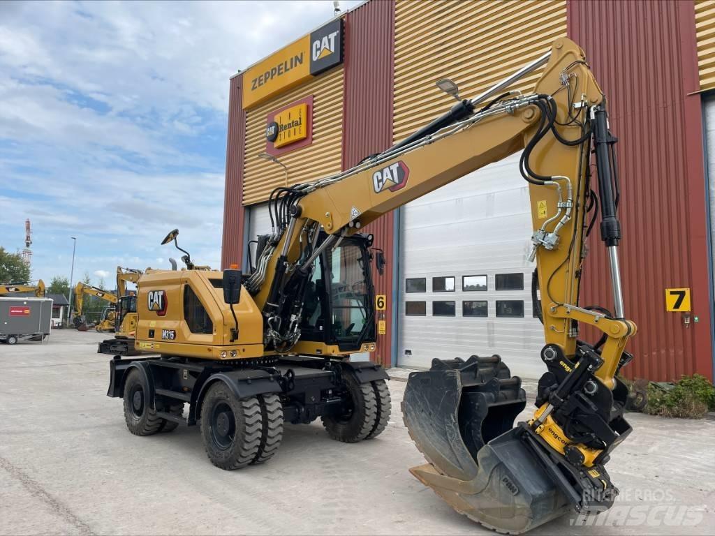 CAT M 315 Pelle sur pneus