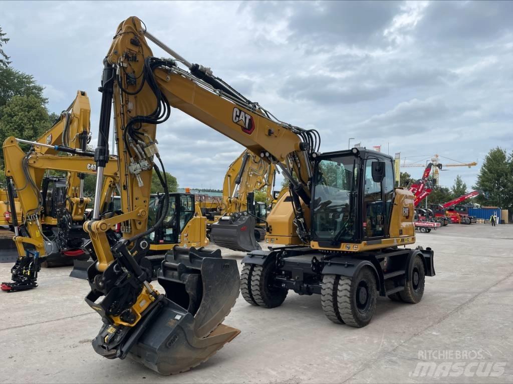 CAT M 315 Pelle sur pneus