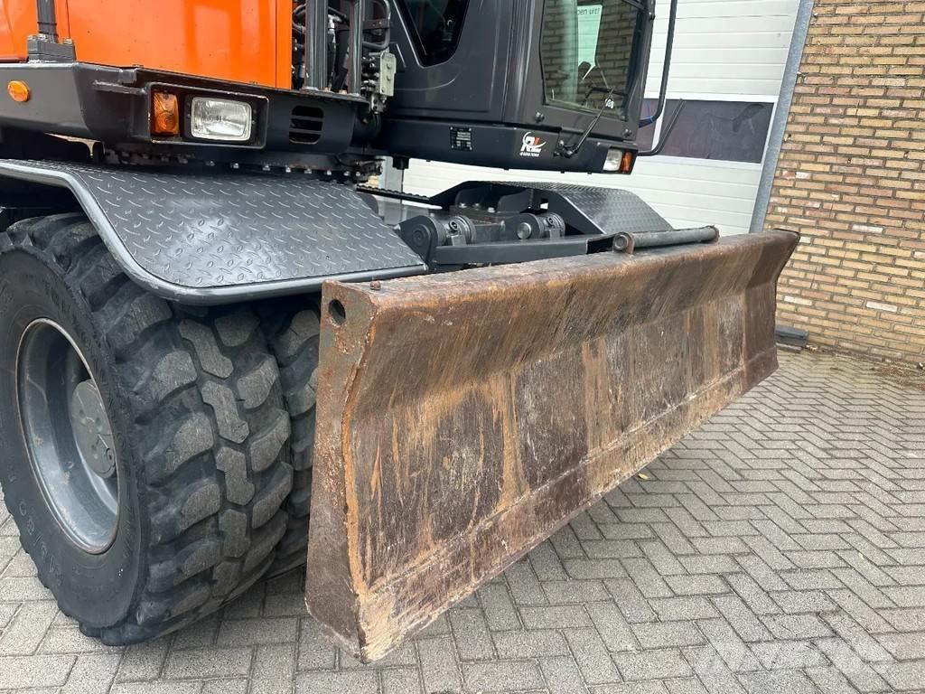Doosan DX140W-5 Pelle sur pneus