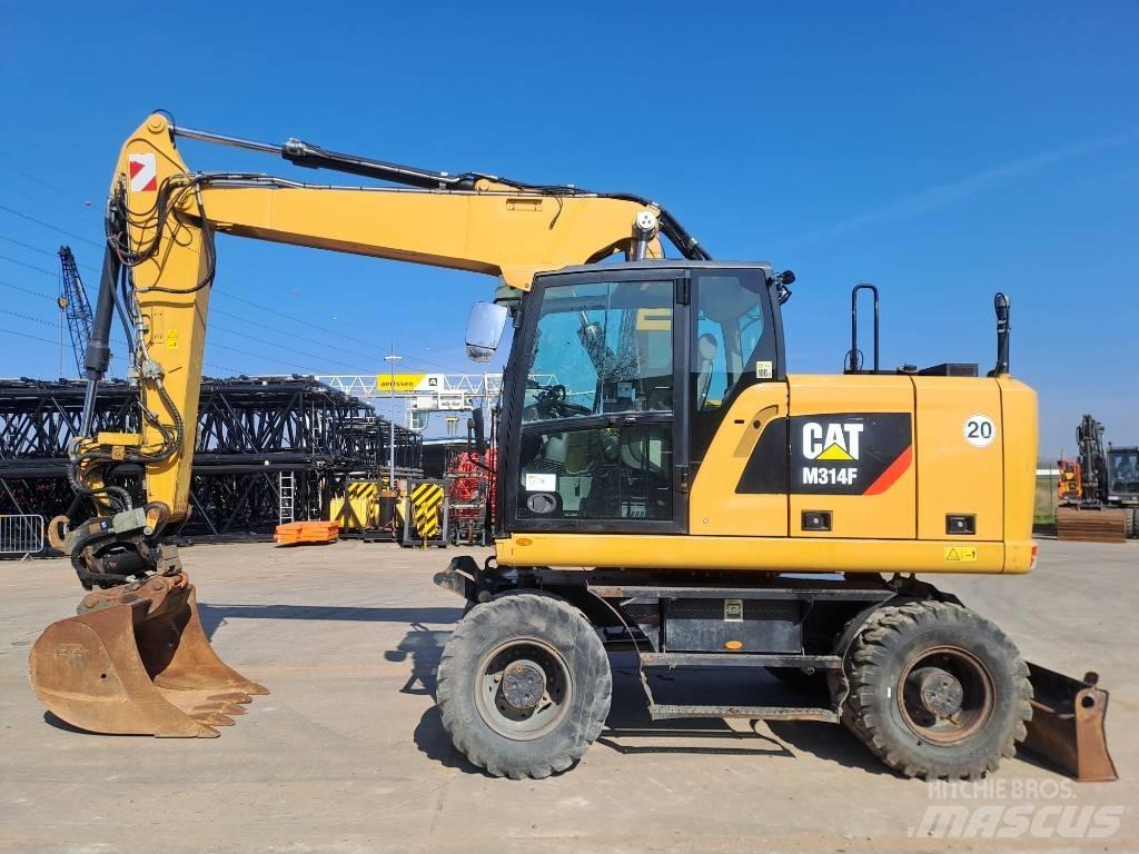 CAT M314F Pelle sur pneus