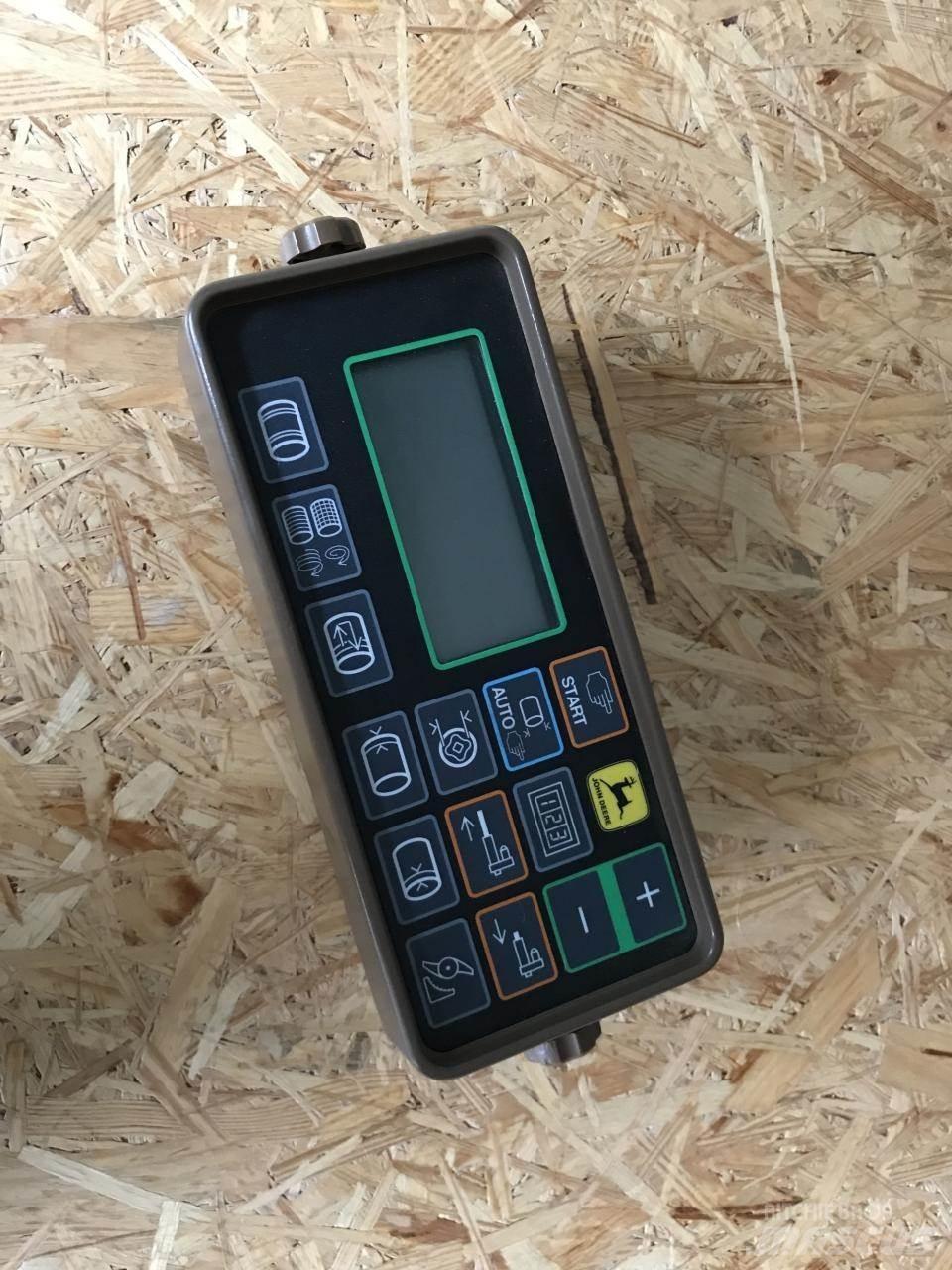 John Deere 590 Presse cubique