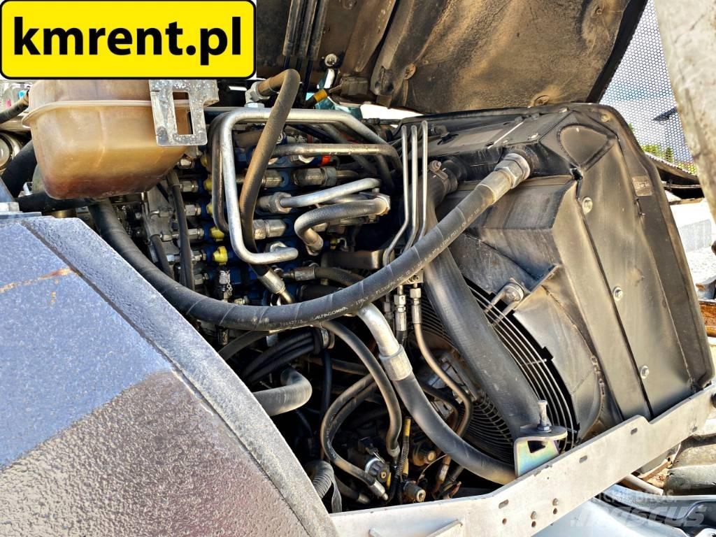 Mecalac 11 Pelle sur pneus