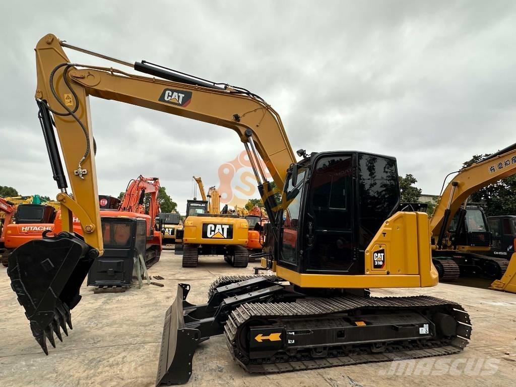 CAT 310 Pelle sur chenilles