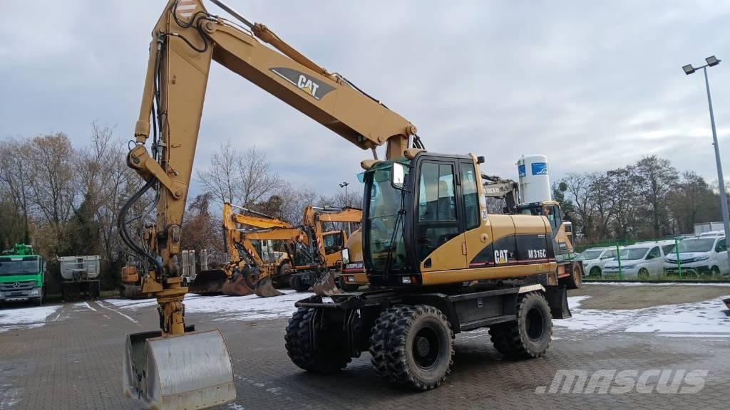 CAT M 316 C Pelle sur pneus