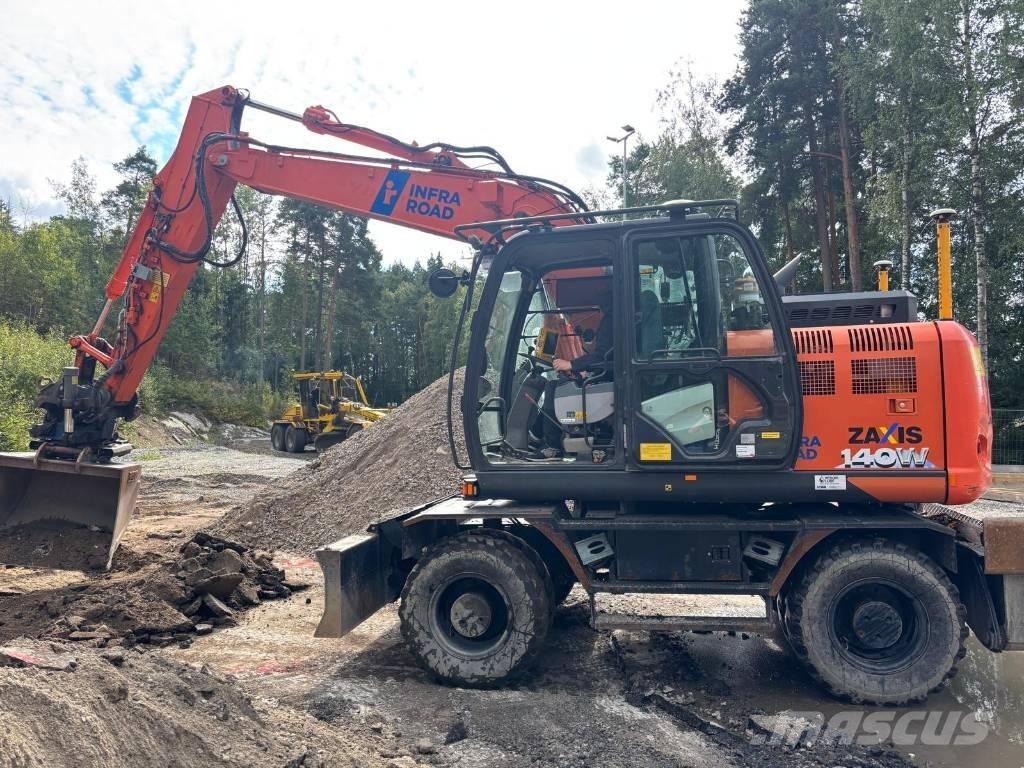 Hitachi ZX 140 W-6 Pelle sur pneus