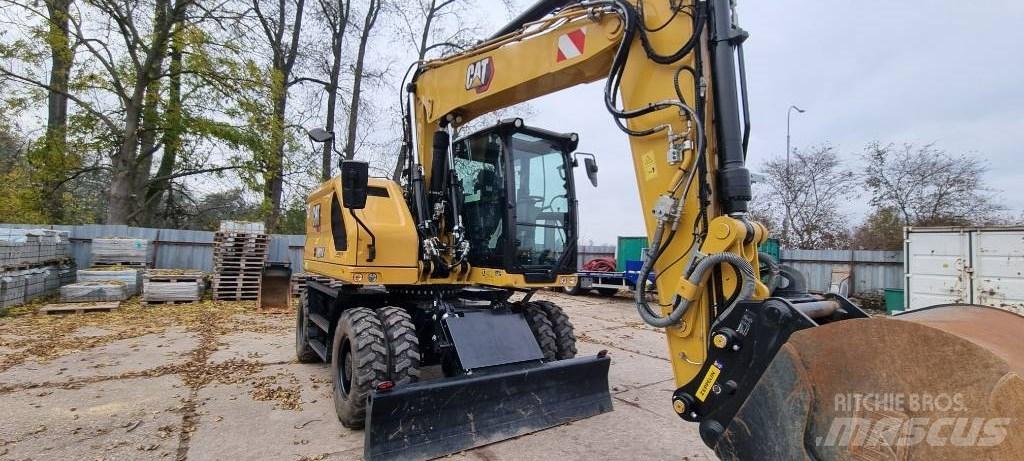 CAT M314 F Pelle sur pneus