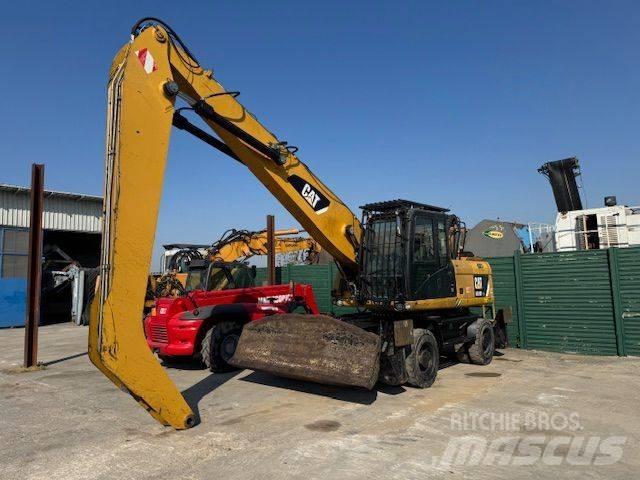 CAT 318D MH Pelle sur pneus