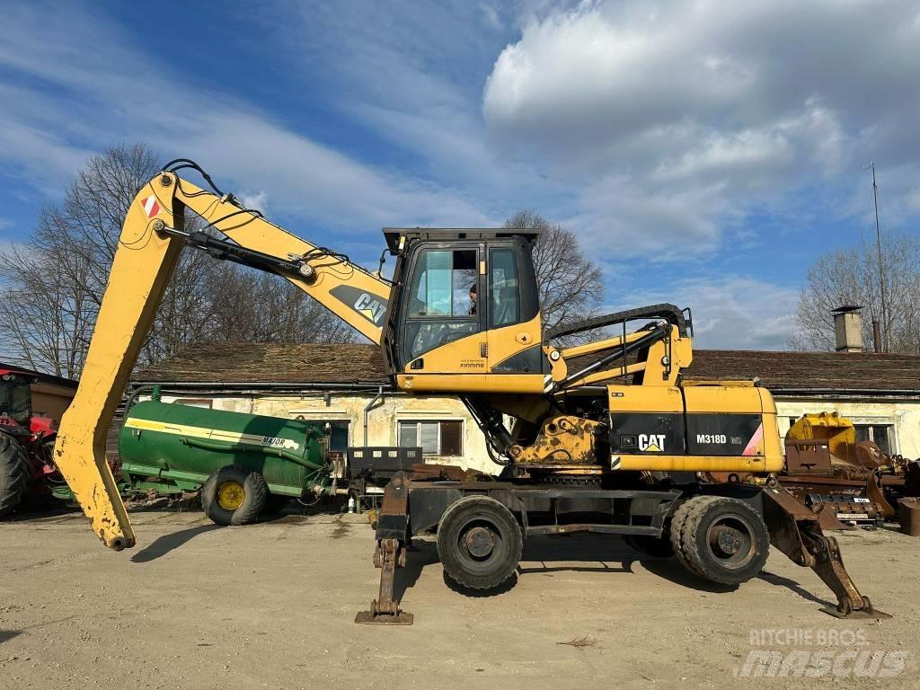 CAT M 318 D MH Pelle à déchets