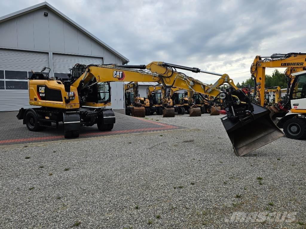 CAT M 315 F Pelle sur pneus