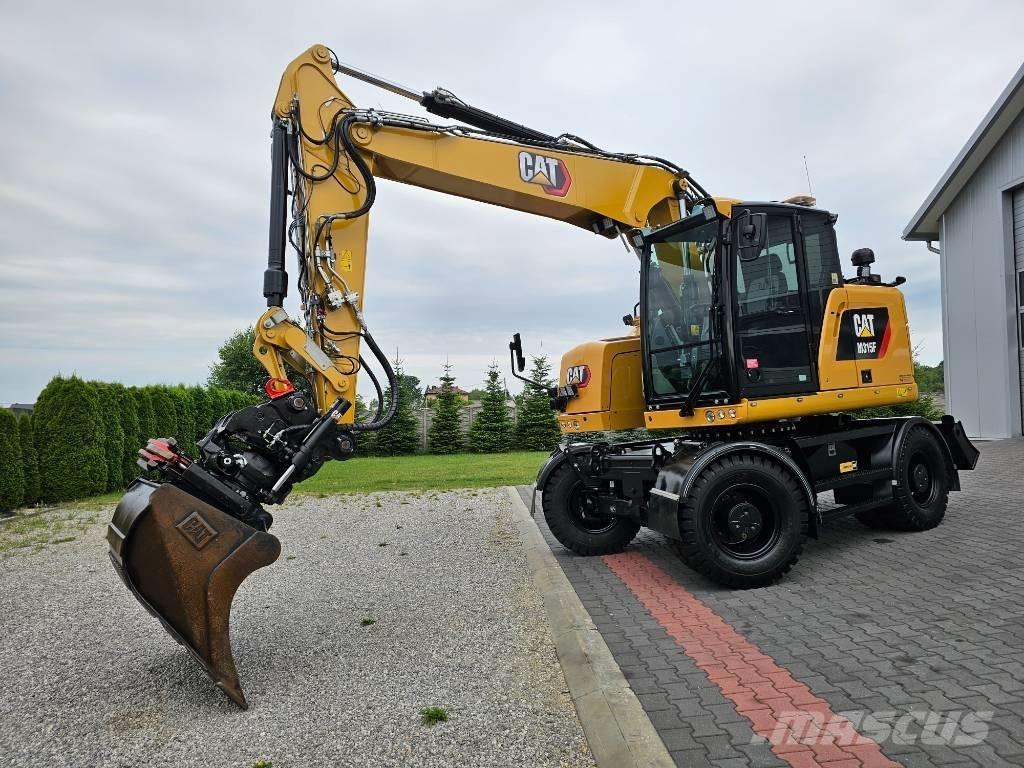 CAT M 315 F Pelle sur pneus