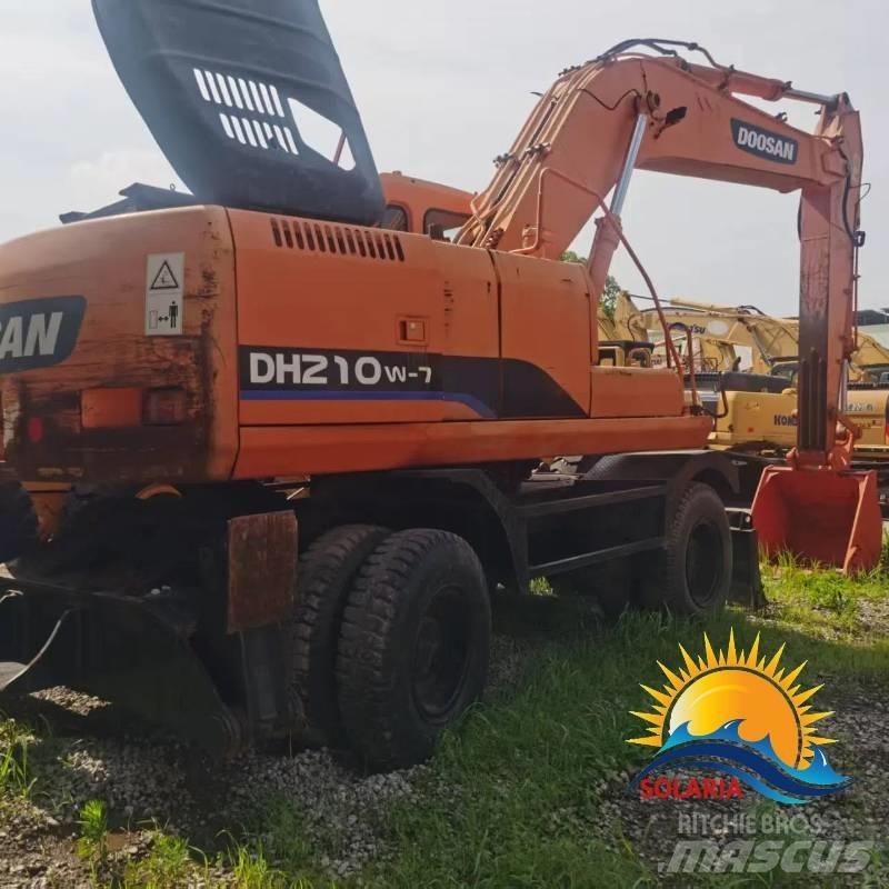 Doosan DH 210 W Pelle sur pneus