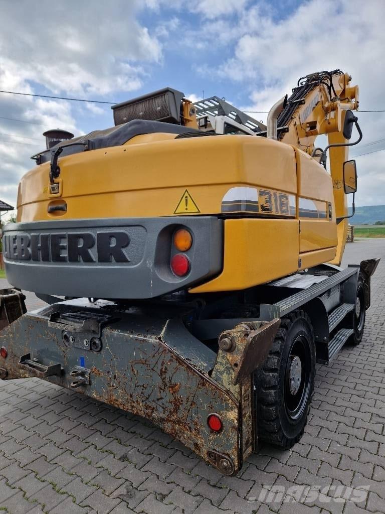 Liebherr 316 Pelle sur pneus