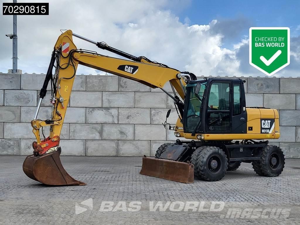 CAT M313 D Pelle sur pneus