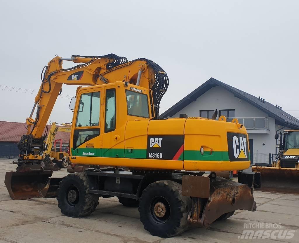 CAT M 316 D Pelle sur pneus