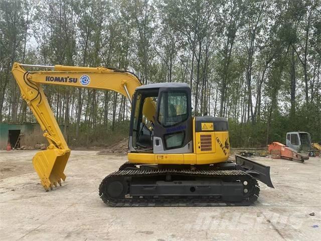 Komatsu PC128US Pelle sur chenilles