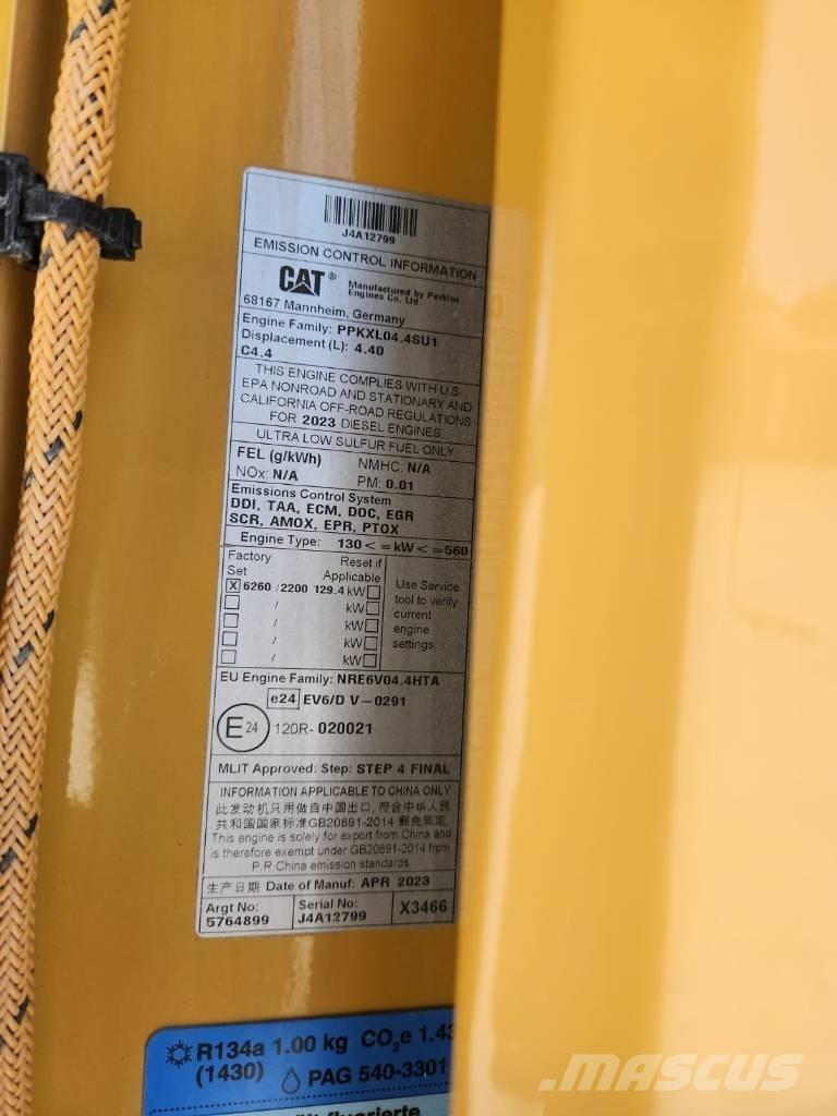 CAT M 318 Pelle sur pneus