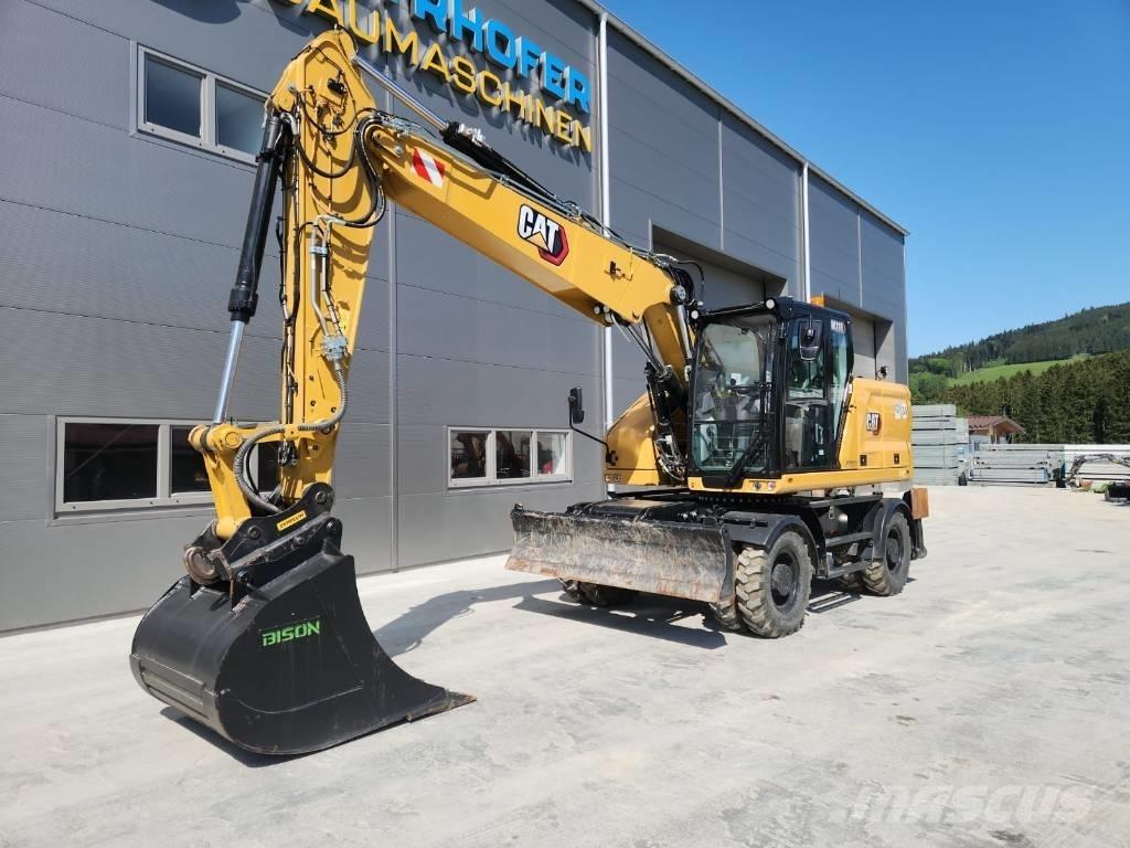 CAT M 318 Pelle sur pneus
