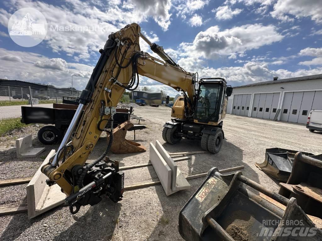 CAT M 314 Pelle sur pneus