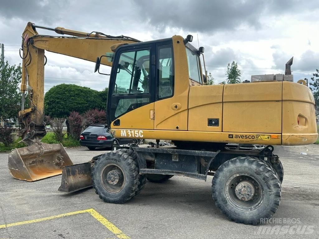 CAT 315 C Pelle sur pneus