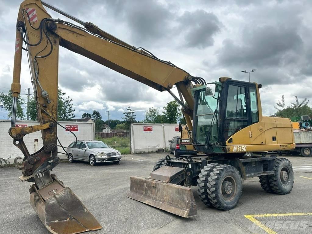 CAT 315 C Pelle sur pneus