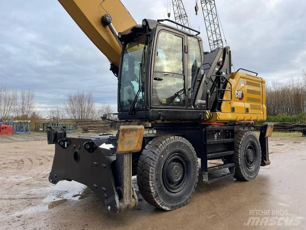 CAT 3040 Pelle à déchets