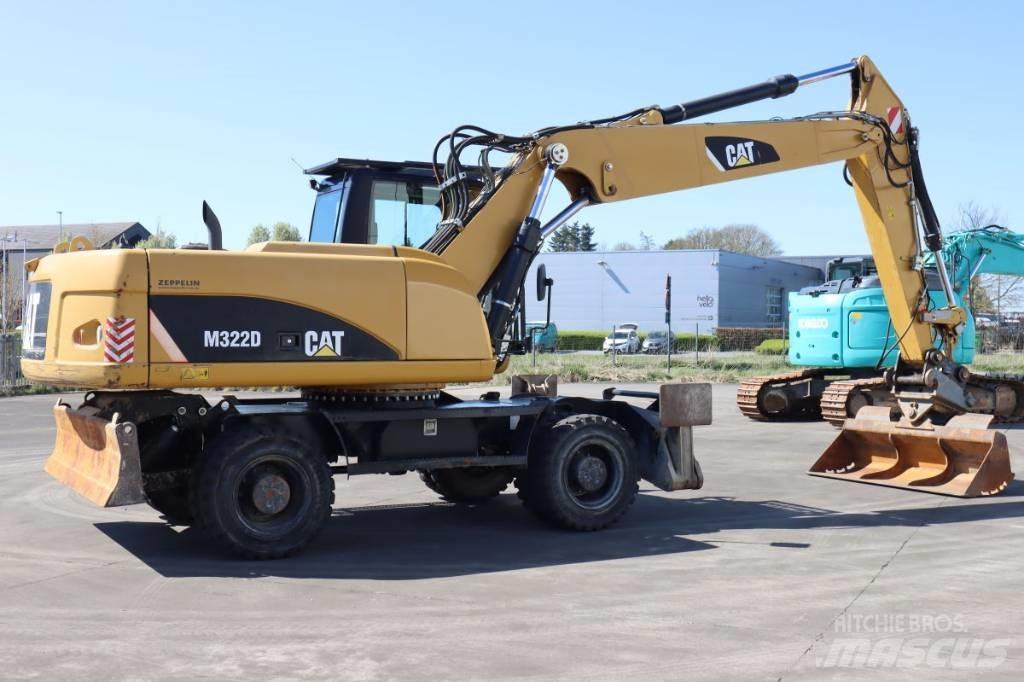 CAT M322D Pelle sur pneus