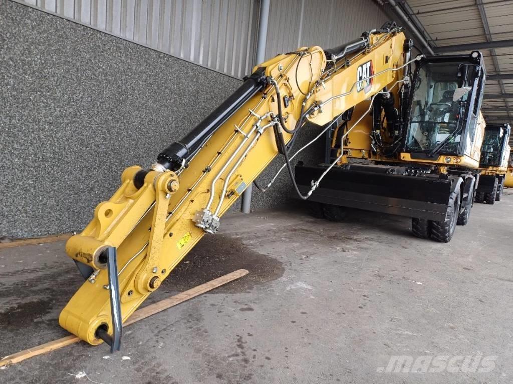 CAT M 320 Pelle sur pneus