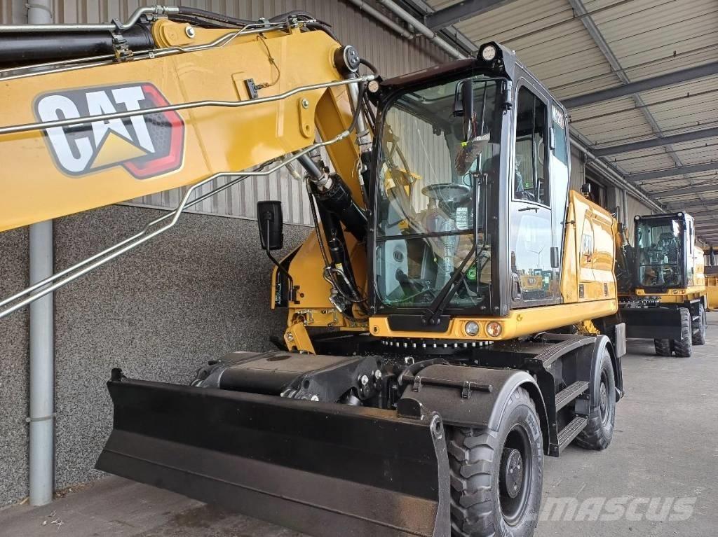 CAT M 320 Pelle sur pneus