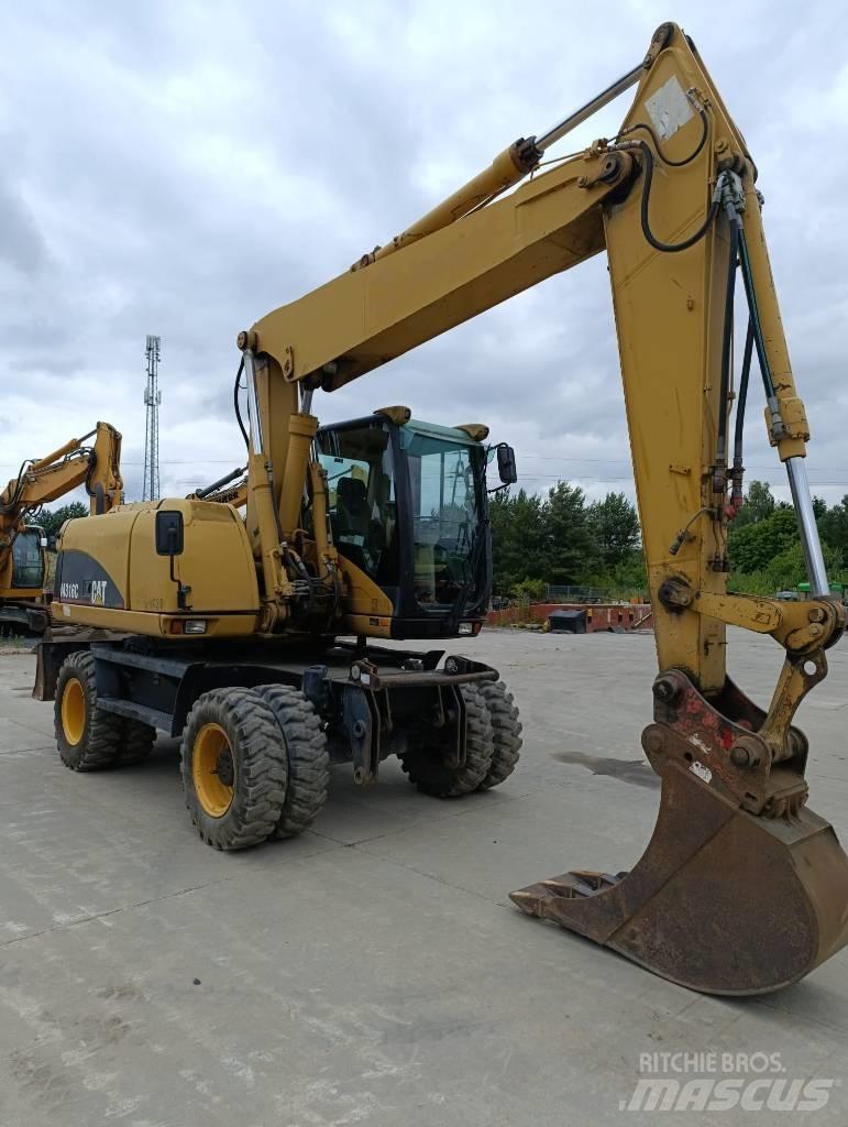 CAT M 316 C Pelle sur pneus