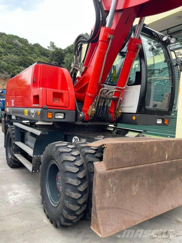 O&K MH 6.6 Pelle sur pneus