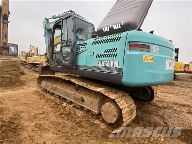 Kobelco SK 210 Pelle sur chenilles