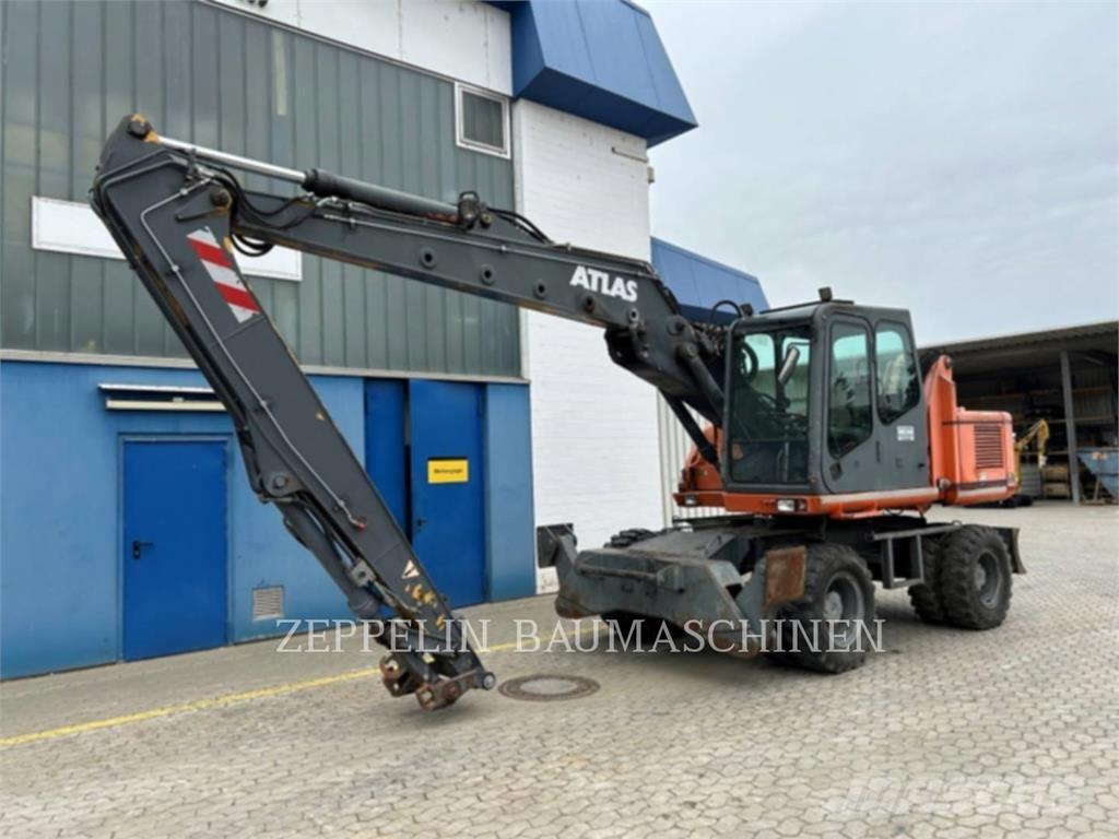 Atlas 1504 Pelle sur pneus