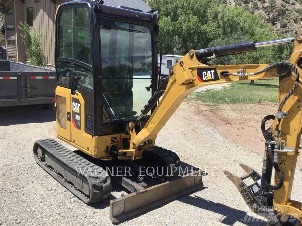 CAT 302 THB Pelle sur chenilles