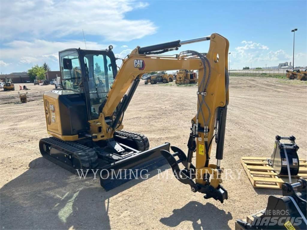 CAT 304 Pelle sur chenilles