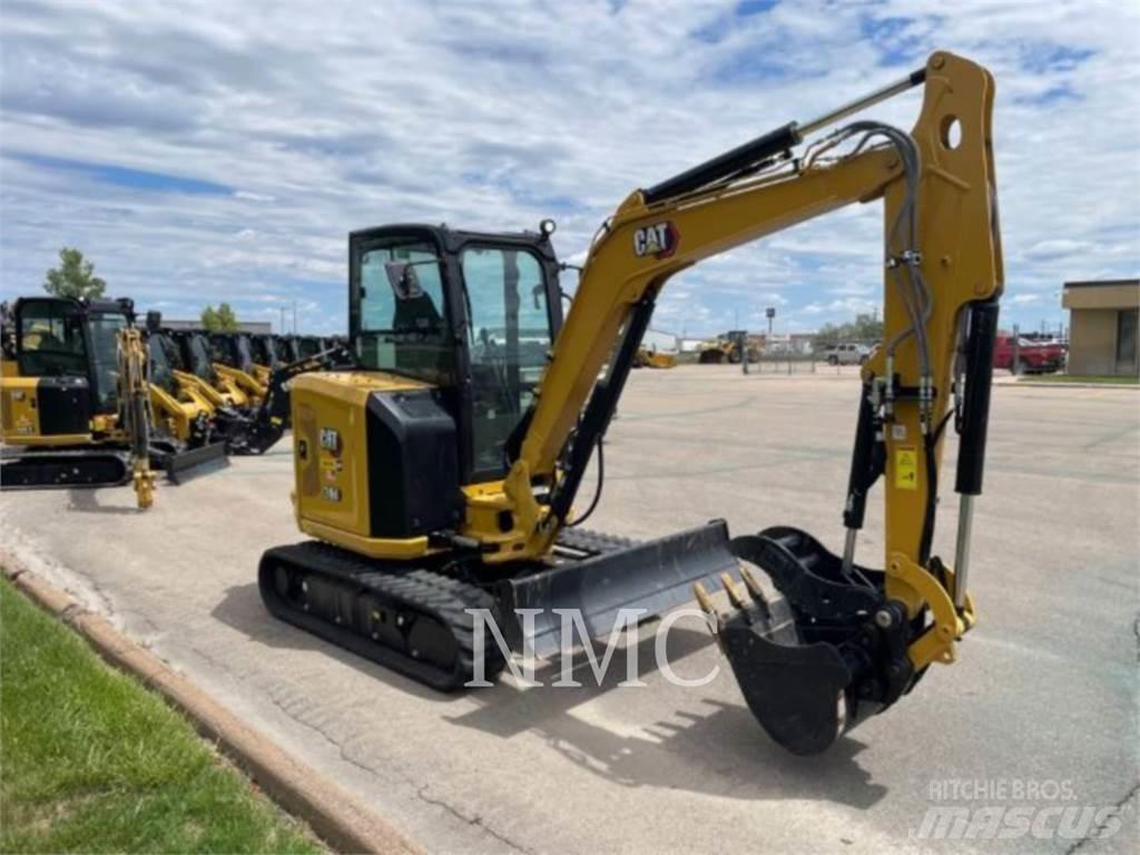 CAT 304-07 Pelle sur chenilles