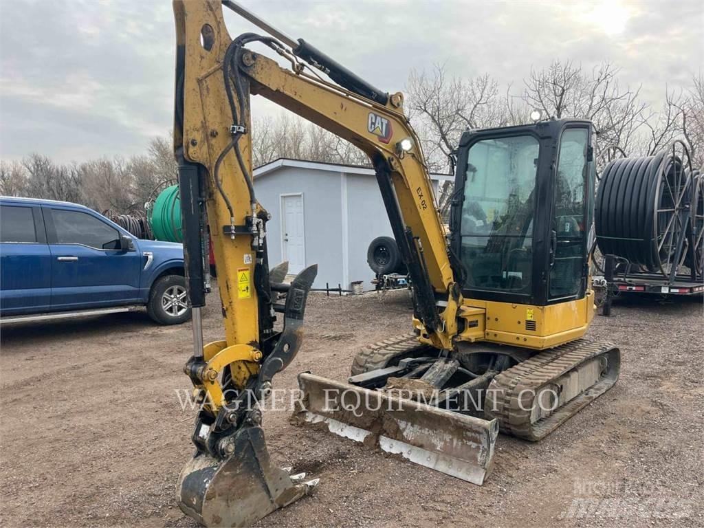 CAT 304 THB Pelle sur chenilles