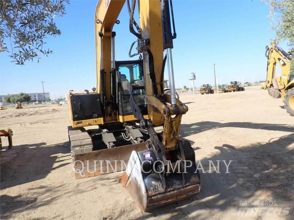 CAT 310 Pelle sur chenilles