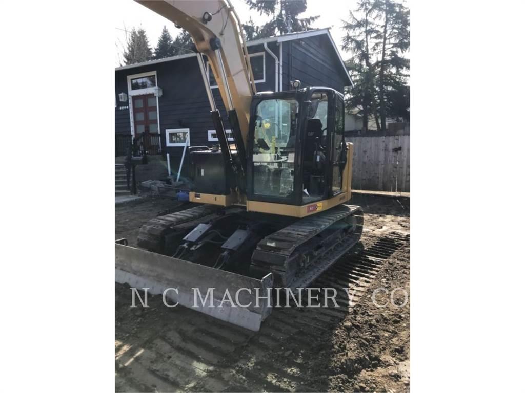 CAT 310 Pelle sur chenilles