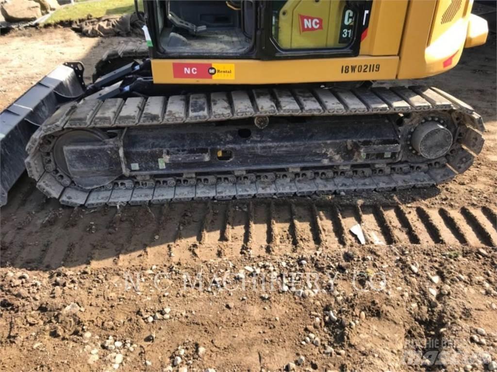 CAT 310 Pelle sur chenilles