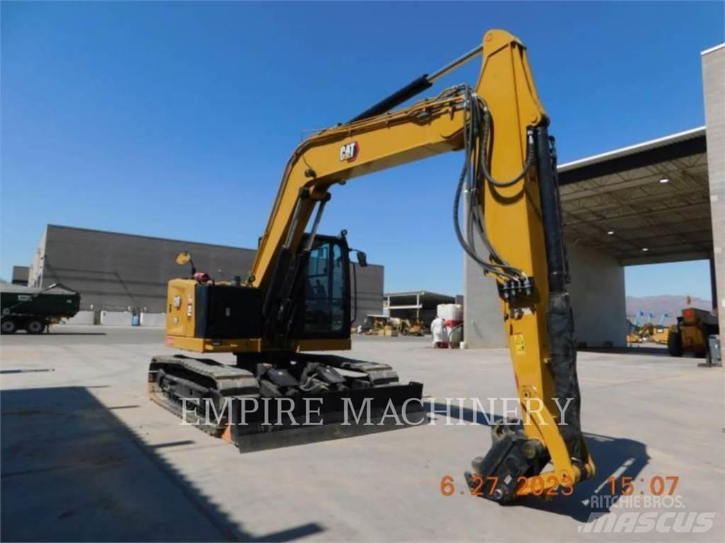 CAT 310-07 Pelle sur chenilles