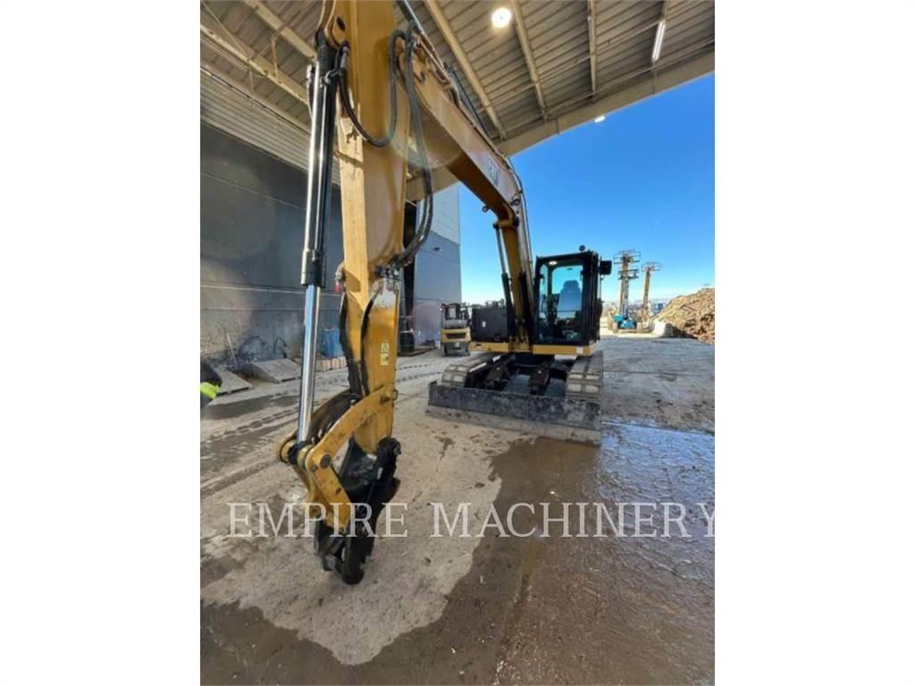 CAT 310-07 Pelle sur chenilles