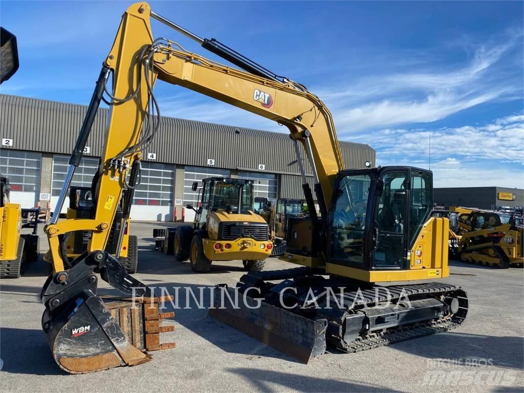 CAT 310-07 Pelle sur chenilles