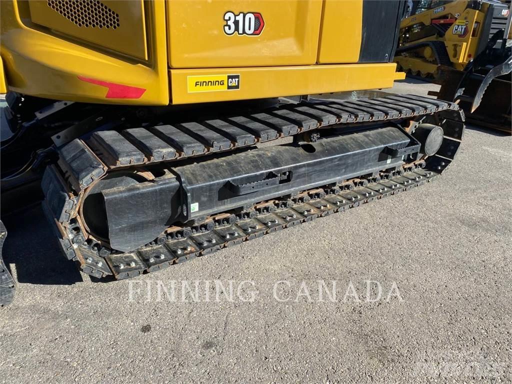 CAT 310-07 Pelle sur chenilles