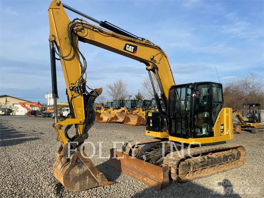 CAT 310-07 Pelle sur chenilles