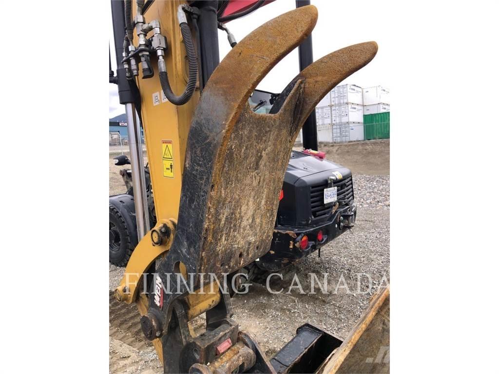 CAT 310-07 Pelle sur chenilles