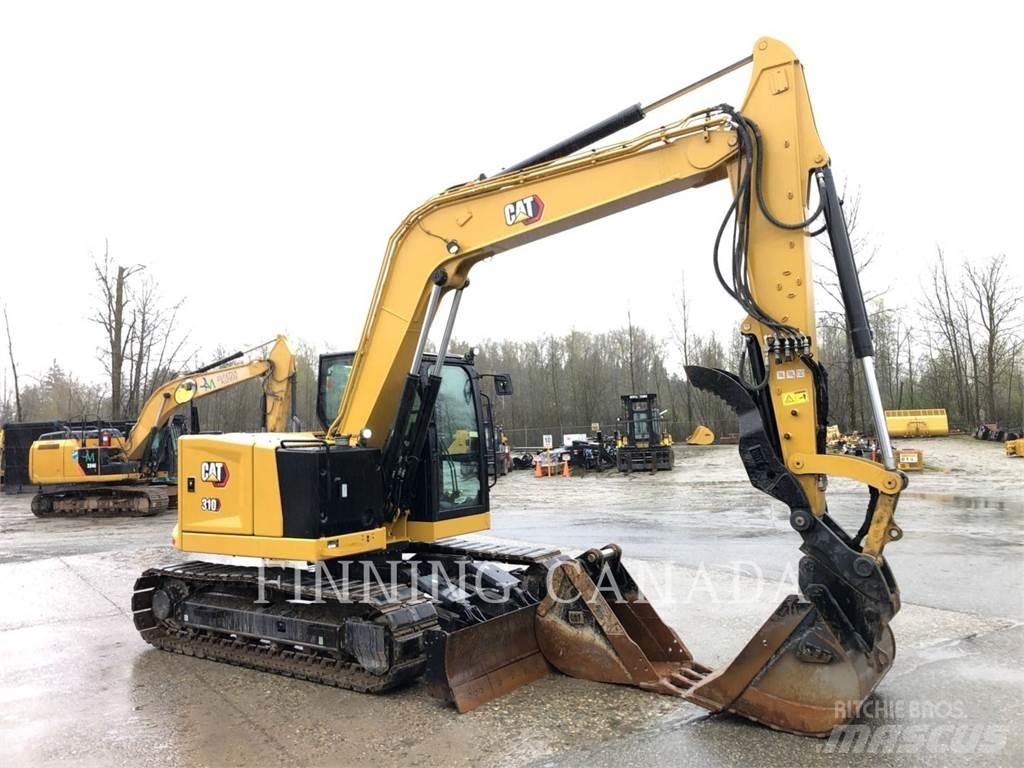 CAT 310-07 Pelle sur chenilles