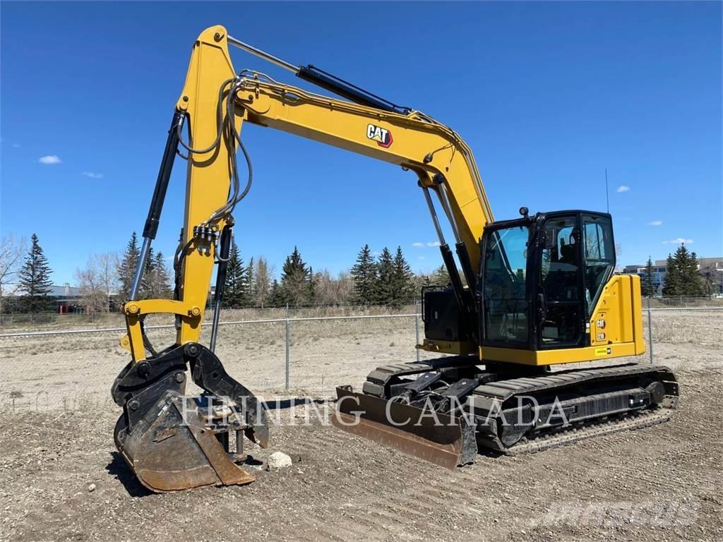CAT 310-07 Pelle sur chenilles
